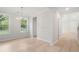 Dining room featuring hardwood floors, a modern chandelier, and multiple windows at 3154 Vanessa Lynne Ln, Johns Island, SC 29455