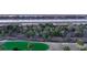 Aerial view showing a lush tree canopy and a river with other houses along the waterfront at 3204 Waterway Blvd, Isle of Palms, SC 29451