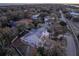 Beautiful two-story home surrounded by lush foliage with a community view in the distance at 3204 Waterway Blvd, Isle of Palms, SC 29451