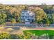 Charming three-story home with a double front porch and private balcony offering beautiful golf course views at 3204 Waterway Blvd, Isle of Palms, SC 29451