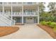 The ground floor garage is accessible from the front or the side of the house, maximizing its utility at 3204 Waterway Blvd, Isle of Palms, SC 29451