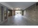 A spacious empty garage with concrete block walls and a view to the outdoors at 3204 Waterway Blvd, Isle of Palms, SC 29451