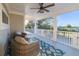 Relaxing outdoor porch with comfortable seating and views of the surrounding trees at 3204 Waterway Blvd, Isle of Palms, SC 29451