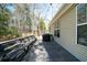 Outdoor wooden deck offering a bench with a lovely view of the yard at 3425 Oxfordshire Ln, Mount Pleasant, SC 29466
