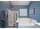 Lovely bathroom featuring a shower, tub, and modern fixtures at 3425 Oxfordshire Ln, Mount Pleasant, SC 29466