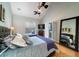 Serene bedroom with vaulted ceiling, window seating, and an en-suite bathroom at 3425 Oxfordshire Ln, Mount Pleasant, SC 29466