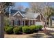 Charming single-story brick home with manicured landscaping and an attached two-car garage at 3425 Oxfordshire Ln, Mount Pleasant, SC 29466