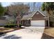 Charming single-story brick home with manicured landscaping and an attached two-car garage at 3425 Oxfordshire Ln, Mount Pleasant, SC 29466