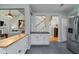Bright kitchen featuring white cabinets, stainless steel appliances, and access to the living area at 3425 Oxfordshire Ln, Mount Pleasant, SC 29466