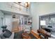 Spacious living room with vaulted ceiling, staircase, and natural light at 3425 Oxfordshire Ln, Mount Pleasant, SC 29466