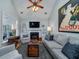 Comfortable living room with fireplace, vaulted ceiling, and ample seating at 3425 Oxfordshire Ln, Mount Pleasant, SC 29466