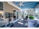 Inviting sunroom with a comfortable seating area and natural light at 3425 Oxfordshire Ln, Mount Pleasant, SC 29466