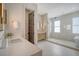 Stylish bathroom with double sinks and glass shower at 40 Pitt St, Charleston, SC 29401