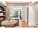 Stylish dining area next to a modern kitchen with stainless steel appliances and bright countertops at 40 Pitt St, Charleston, SC 29401