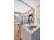 Open-concept living and kitchen area with modern countertops, custom shelving, and a comfortable, inviting atmosphere at 40 Pitt St, Charleston, SC 29401