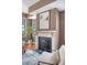 Living room featuring a cozy seating area and fireplace, perfect for relaxing and entertaining at 40 Pitt St, Charleston, SC 29401