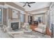 Bright living room boasts hardwood floors, fireplace, and modern decor that create a cozy and inviting ambiance at 40 Pitt St, Charleston, SC 29401