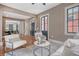 Cozy living room with beautiful hardwood floors, comfortable seating, and plenty of natural light at 40 Pitt St, Charleston, SC 29401