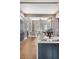 The living room area presents an open floor plan, seamlessly connecting to a modern kitchen space at 40 Pitt St, Charleston, SC 29401