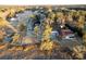 Stunning aerial view of estate with mature trees, pond, pool, and multiple structures on expansive acreage at 4009 Ballovista Rd, Johns Island, SC 29455