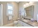 Tastefully decorated bathroom with vanity, framed mirror, and neutral finishes at 4009 Ballovista Rd, Johns Island, SC 29455