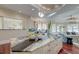 Kitchen view with marble island, white cabinets, and open floor plan at 4009 Ballovista Rd, Johns Island, SC 29455