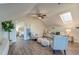 Bright living area featuring a skylight, desk, and comfortable seating at 4009 Ballovista Rd, Johns Island, SC 29455