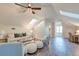 Bright living area featuring skylights, a comfortable sofa, and neutral decor at 4009 Ballovista Rd, Johns Island, SC 29455