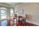 Charming sitting area with a view of the water, featuring hardwood floors and elegant furnishings at 4009 Ballovista Rd, Johns Island, SC 29455