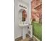 Cozy bathroom features a pedestal sink, wood-look flooring, and a beautiful cherry blossom wall at 402 Pine Bluff Dr, Summerville, SC 29483