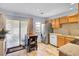 Kitchen with hard wood floors, kitchen island, sliding glass doors, and stainless steel appliances at 402 Pine Bluff Dr, Summerville, SC 29483