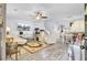 Bright living room with wood floors, ceiling fan, modern furniture, and entertainment center at 402 Pine Bluff Dr, Summerville, SC 29483