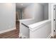 A light and airy hallway with hardwood flooring at 413 Renau Blvd, Summerville, SC 29483