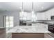 Spacious kitchen with stainless steel appliances, granite counters, and island at 413 Renau Blvd, Summerville, SC 29483