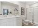 Bright bathroom with double vanity, quartz countertops, glass shower, and modern fixtures at 4159 Rising Tide Dr, Summerville, SC 29485