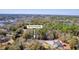 Expansive aerial view of the property at 4462 Francis Younge Way surrounded by lush greenery and scenic water features at 4462 Francis Yonge Way, Hollywood, SC 29449