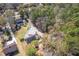 Aerial view of homes in a wooded area showing mature trees, driveways, and rooflines at 4462 Francis Yonge Way, Hollywood, SC 29449