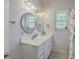 Bathroom features double sinks, decorative mirrors, and ample counter space at 4462 Francis Yonge Way, Hollywood, SC 29449