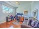 Office space with large desk and oversized window provides great natural light at 4462 Francis Yonge Way, Hollywood, SC 29449
