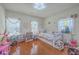 Cheerful bedroom with hardwood floors, lots of natural light, and ample space at 4462 Francis Yonge Way, Hollywood, SC 29449