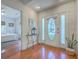 Bright entryway with hardwood floors and decorative accents at 4462 Francis Yonge Way, Hollywood, SC 29449