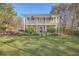 Beautiful two-story home with a spacious front yard and inviting curb appeal at 4462 Francis Yonge Way, Hollywood, SC 29449