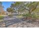 Charming home with large trees, a well-manicured lawn and a long private driveway at 4462 Francis Yonge Way, Hollywood, SC 29449