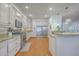 Well-equipped kitchen with stainless steel appliances, granite counters, and bright lighting at 4462 Francis Yonge Way, Hollywood, SC 29449