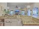 Kitchen featuring granite counters and view of living spaces and access to dining at 4462 Francis Yonge Way, Hollywood, SC 29449
