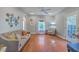 Cozy living room with hardwood floors, and a neutral color palette at 4462 Francis Yonge Way, Hollywood, SC 29449