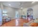 Cozy living room with hardwood floors, ceiling fan, and neutral paint color and decor at 4462 Francis Yonge Way, Hollywood, SC 29449