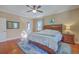 Inviting main bedroom with a plush bed and warm, neutral tones at 4462 Francis Yonge Way, Hollywood, SC 29449