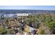 Aerial view of a single Gathering residence nestled among dense trees. Address: 4462 Francis Younge Way at 4462 Francis Yonge Way, Hollywood, SC 29449