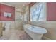 Elegant bathroom featuring a freestanding tub, glass-enclosed shower, and recessed lighting at 4462 Francis Yonge Way, Hollywood, SC 29449